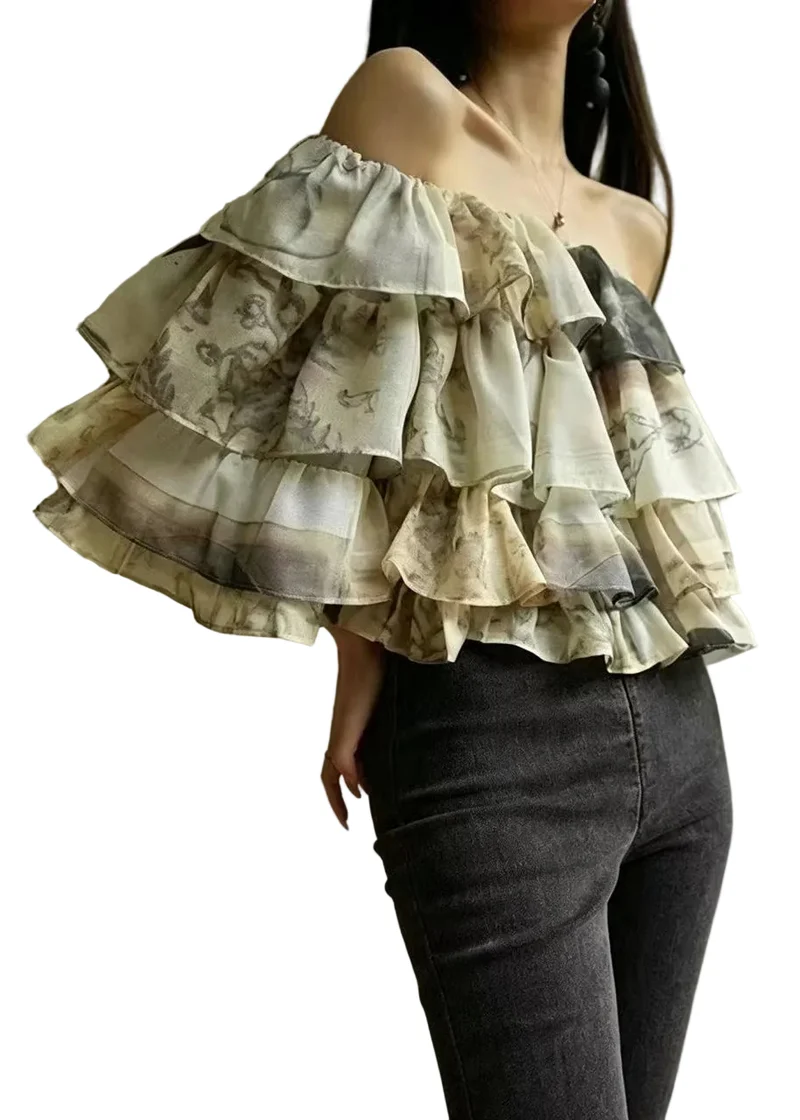Damesblouse met schuine hals en gelaagde print