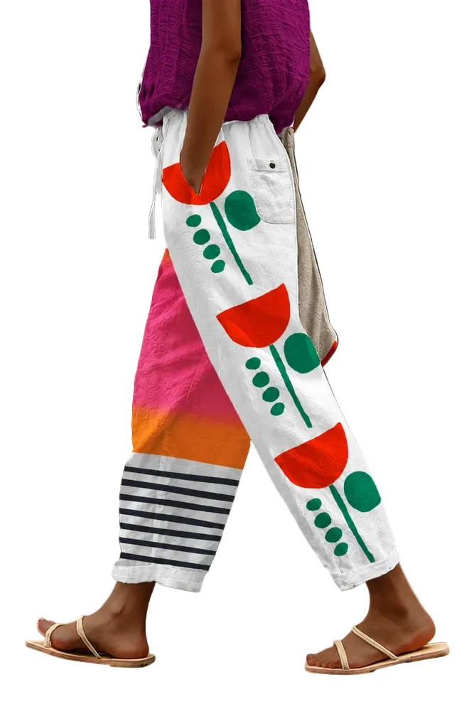 Damesbroek met unieke print en zakken met knoopsluiting.